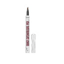Eyebrow micropigmenting pen with cap on a white background