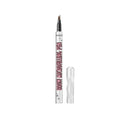 Eyebrow micropigmenting pen with cap on a white background