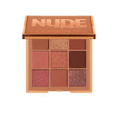 Huda Beauty nude makeup palette on a white background