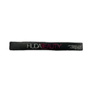 HUDA BEAUTY eyeliner pencil on a white background