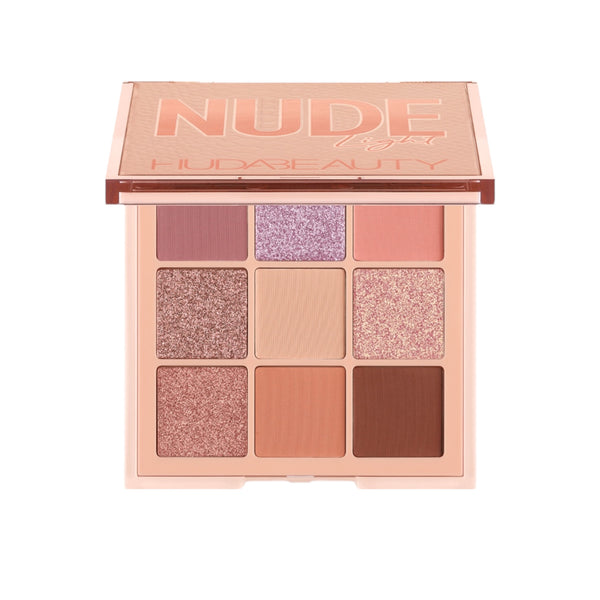 Makeup palette with 'NUDE' text on a white background
