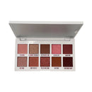 Makeup palette with various shades of eyeshadows on a white background