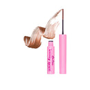 Pink mascara with black wand on a white background