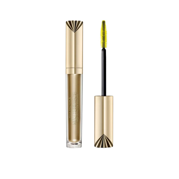 Mascara with gold casing and black wand on a white background
