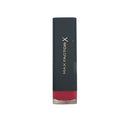 Max Factor lipstick with black cap and red base on a white background