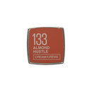 Cosmetic color sample with shade number 133 labeled 'Almond Hustle' on a white background