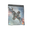 DVD cover of 'Tenet' with a character holding a gun on a white background